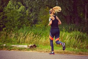 Woman running - sweating